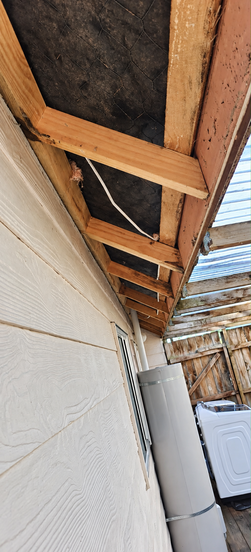 Exposed eaves and framing during exterior building work